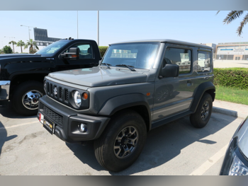 سوزوكي  جمني  2021  عادي  15,000 كم  4 سلندر  دفع رباعي  اس يو في  رمادي  تحت الضمان