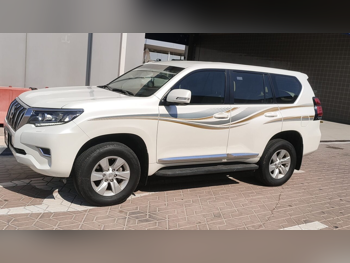تويوتا  برادو  تي اكس ال  2018  اوتوماتيك  67,000 كم  6 سلندر  دفع رباعي  اس يو في  أبيض