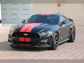 Ford  Mustang  GT  2015  Automatic  124,000 Km  8 Cylinder  Rear Wheel Drive (RWD)  Coupe / Sport  Black and Red