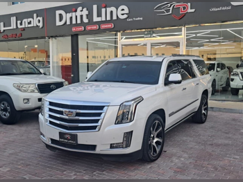 Cadillac  Escalade  Platinum  2016  Automatic  130,000 Km  8 Cylinder  Four Wheel Drive (4WD)  SUV  White