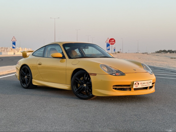 Porsche  911  Carrera  2001  Automatic  181,000 Km  6 Cylinder  Rear Wheel Drive (RWD)  Coupe / Sport  Yellow