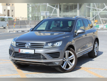 Volkswagen  Touareg  R line  2015  Automatic  140,000 Km  6 Cylinder  Four Wheel Drive (4WD)  SUV  Gray