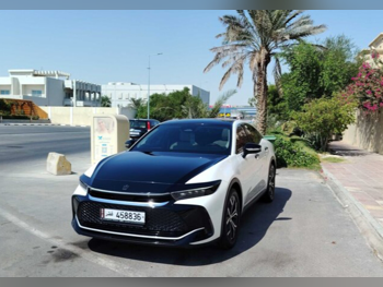 Toyota  Crown  Hybrid  2023  Automatic  26,000 Km  4 Cylinder  Front Wheel Drive (FWD)  Sedan  White and Black  With Warranty