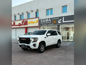 جي ام سي  يوكون  اس ال اي  2023  اوتوماتيك  15,000 كم  8 سلندر  دفع خلفي  اس يو في  أبيض