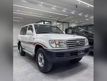 تويوتا  لاند كروزر  جي اكس  2003  اوتوماتيك  300,000 كم  6 سلندر  دفع رباعي  اس يو في  أبيض