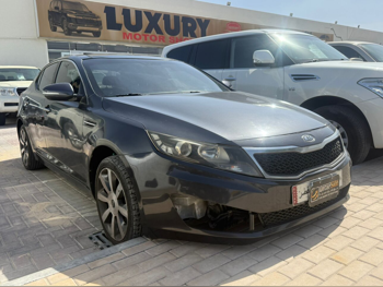 Kia  Optima  2012  Automatic  233,000 Km  4 Cylinder  Front Wheel Drive (FWD)  Sedan  Dark Gray