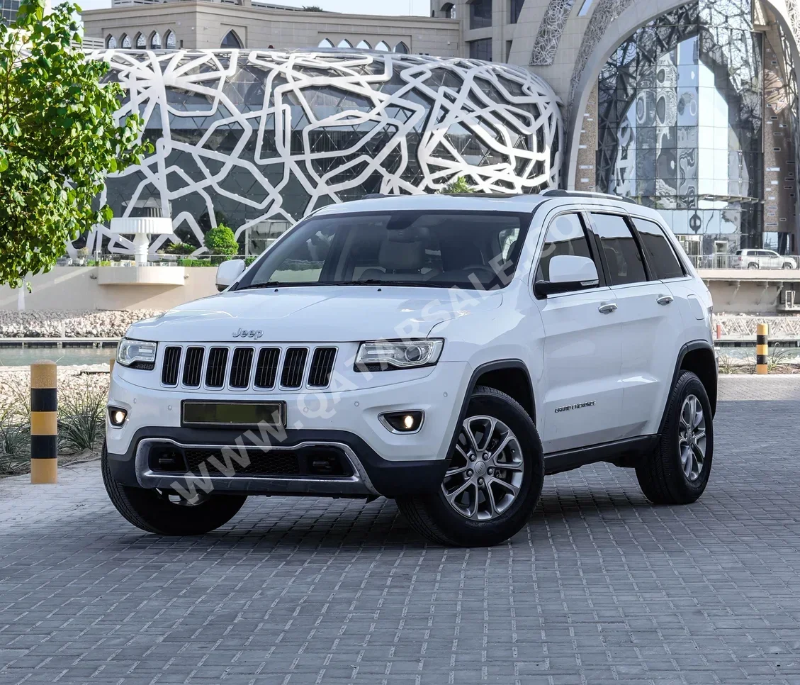 Jeep  Grand Cherokee  Limited  2015  Automatic  79,000 Km  8 Cylinder  Four Wheel Drive (4WD)  SUV  White