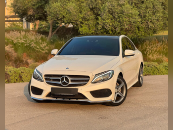 Mercedes-Benz  C-Class  200 AMG  2015  Automatic  89,000 Km  4 Cylinder  Rear Wheel Drive (RWD)  Sedan  White