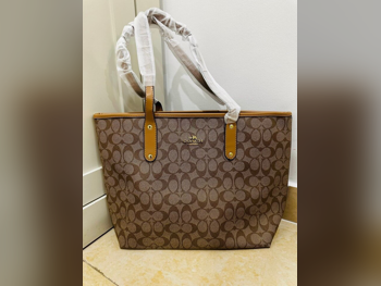 حقيبة توتي  - بنى  - جلد صناعي  - نسائي