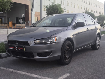 Mitsubishi  Lancer  EX  2014  Automatic  223,000 Km  4 Cylinder  Front Wheel Drive (FWD)  Sedan  Gray