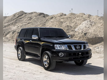 Nissan  Patrol  Super Safari  2022  Automatic  33,000 Km  6 Cylinder  Four Wheel Drive (4WD)  SUV  Black