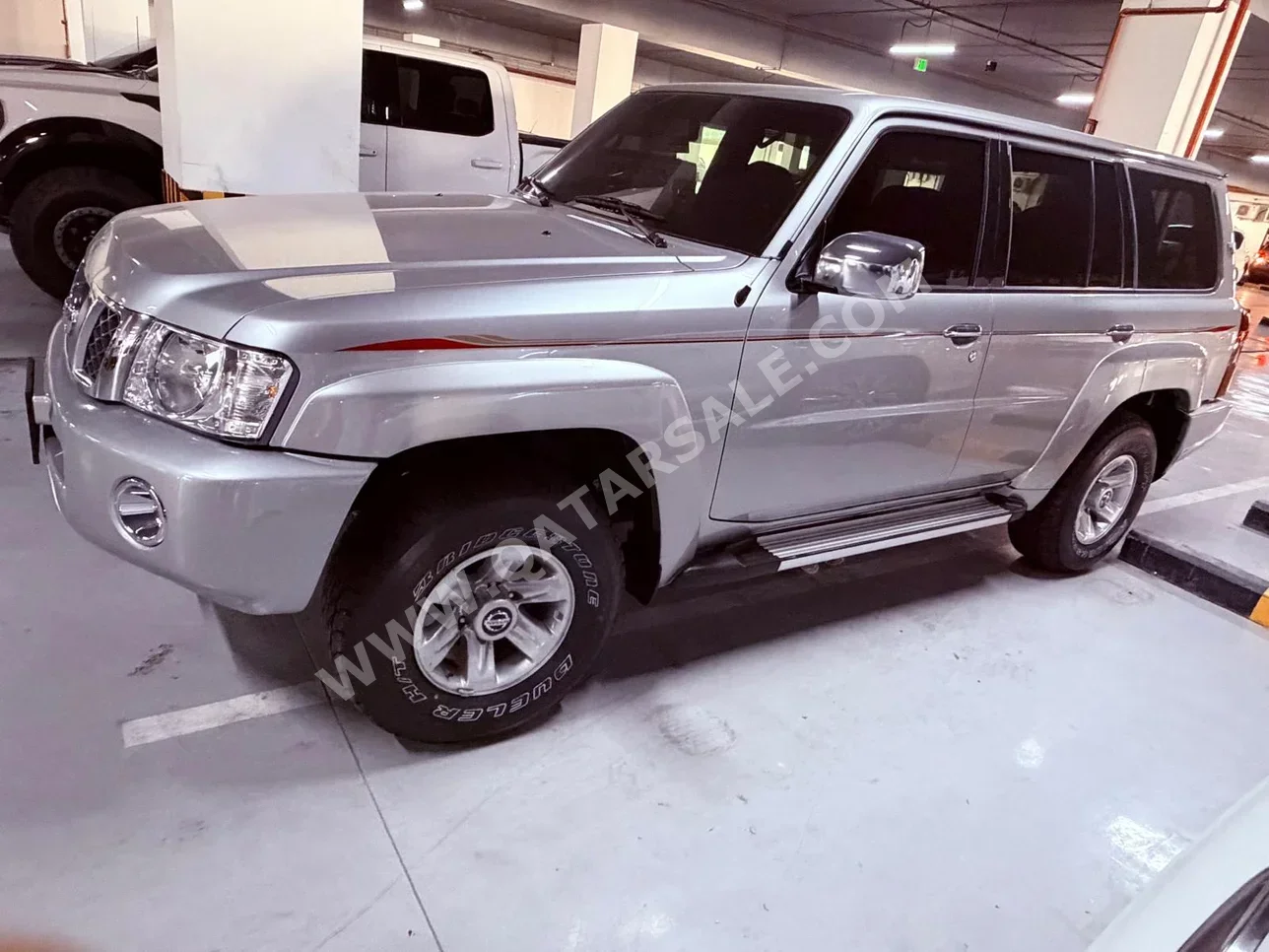 Nissan  Patrol  Safari  2024  Manual  0 Km  6 Cylinder  Four Wheel Drive (4WD)  SUV  Silver  With Warranty