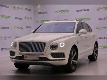 Bentley  Bentayga  2018  Automatic  64,000 Km  12 Cylinder  Four Wheel Drive (4WD)  SUV  Pearl