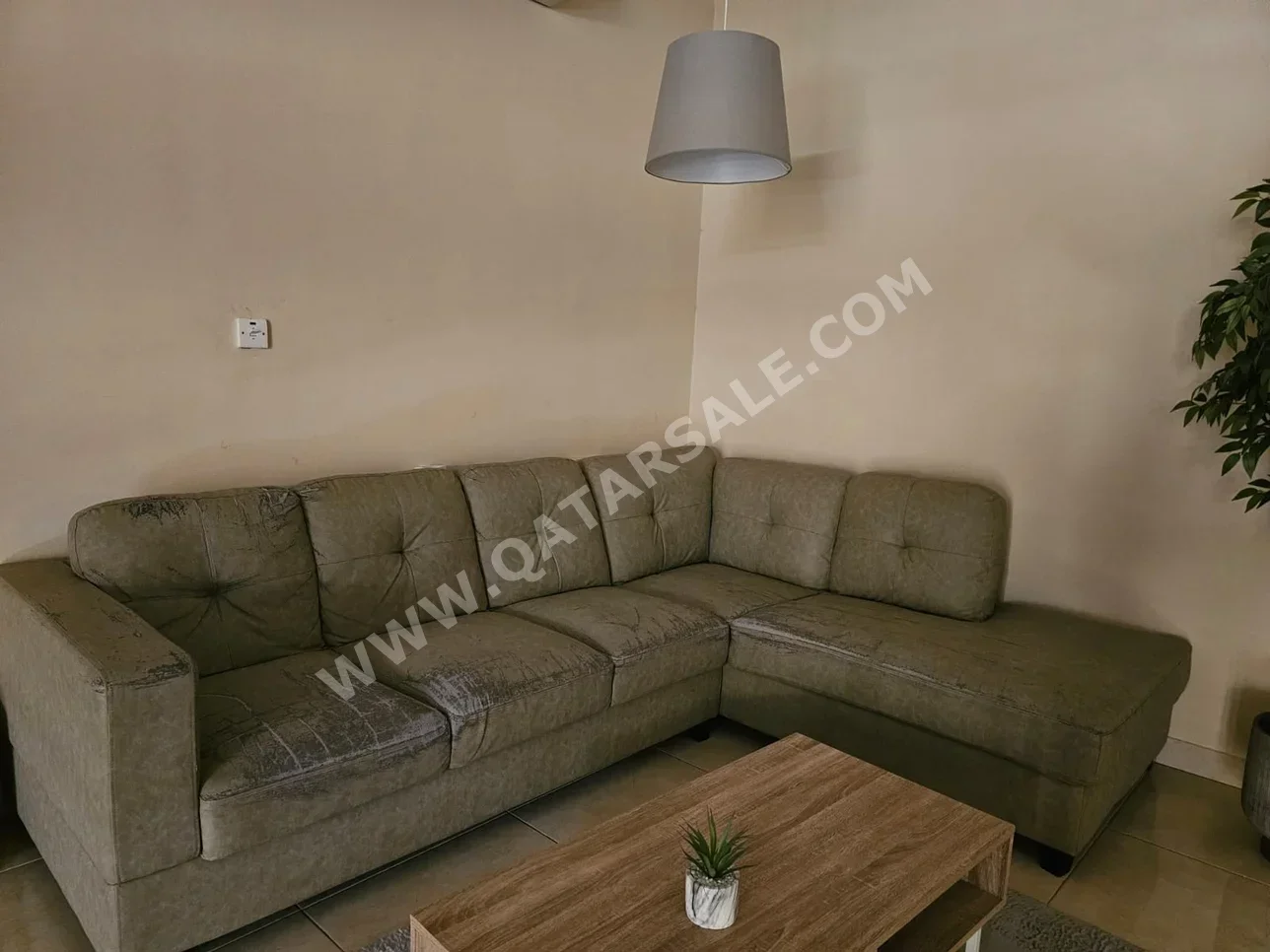 الأرائك والكنب والكراسي شكل L  - أخضر