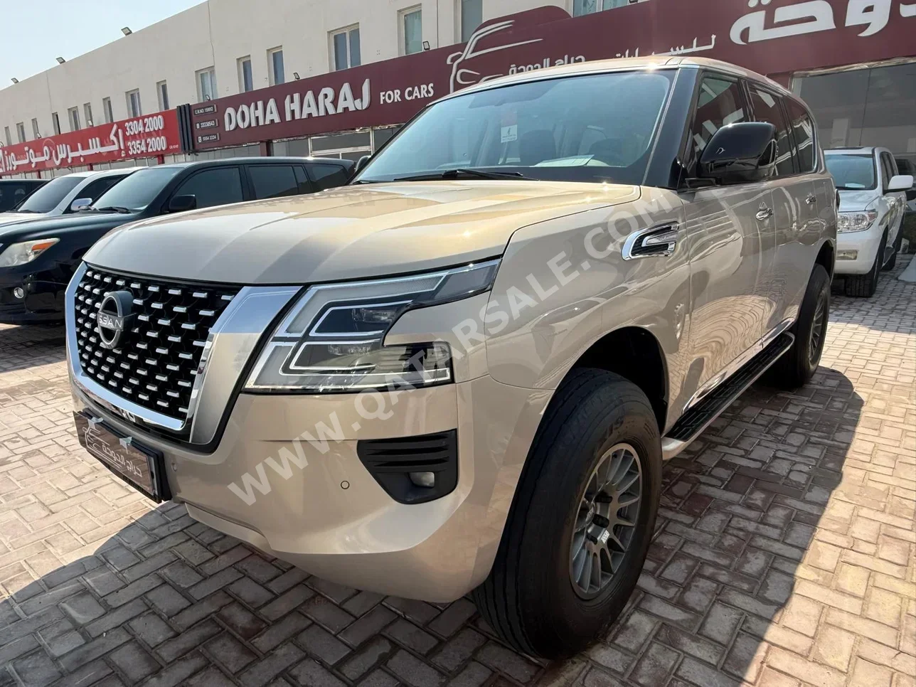 Nissan  Patrol  XE  2022  Automatic  219,000 Km  6 Cylinder  Four Wheel Drive (4WD)  SUV  Gold
