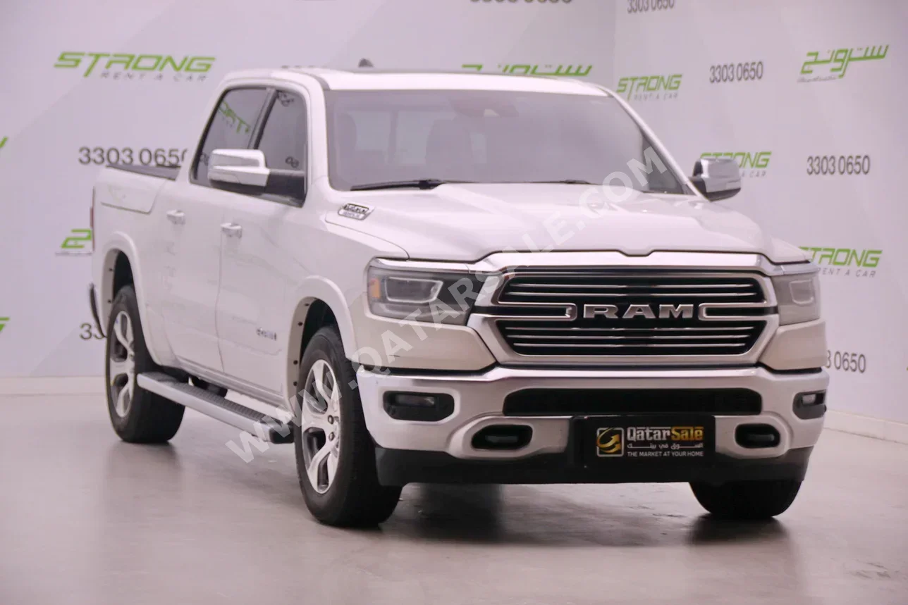 Dodge  Ram  1500 Laramie  2021  Automatic  207,000 Km  8 Cylinder  Four Wheel Drive (4WD)  Pick Up  White