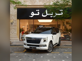 Nissan  Patrol  Platinum  2025  Automatic  22,780 Km  6 Cylinder  Four Wheel Drive (4WD)  SUV  White  With Warranty