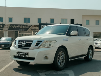 نيسان  باترول  ال اي  2016  اوتوماتيك  284,000 كم  8 سلندر  دفع رباعي  اس يو في  أبيض