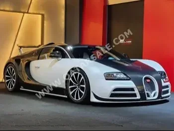 Bugatti  Veyron  2006  Automatic  5,386 Km  16 Cylinder  All Wheel Drive (AWD)  Coupe / Sport  White and Black  With Warranty