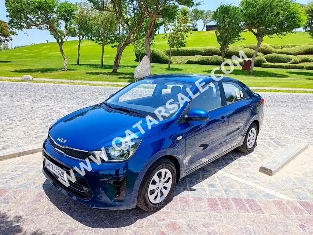 Kia  Pegas  4 Cylinder  Sedan  Blue  2022