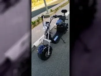 سكوتر العجلة الكبيرة  - أسود