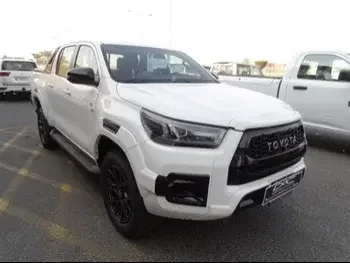 Toyota  Hilux  GR Sport  2023  Automatic  0 Km  6 Cylinder  Four Wheel Drive (4WD)  Pick Up  White  With Warranty
