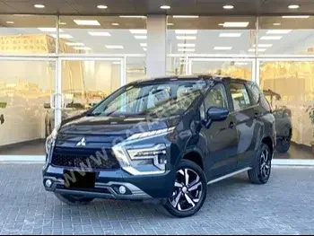 Mitsubishi  Xpander  2024  Automatic  0 Km  4 Cylinder  Front Wheel Drive (FWD)  SUV  Gray  With Warranty