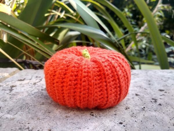 Orange crochet pumpkin pin cushion - main product image