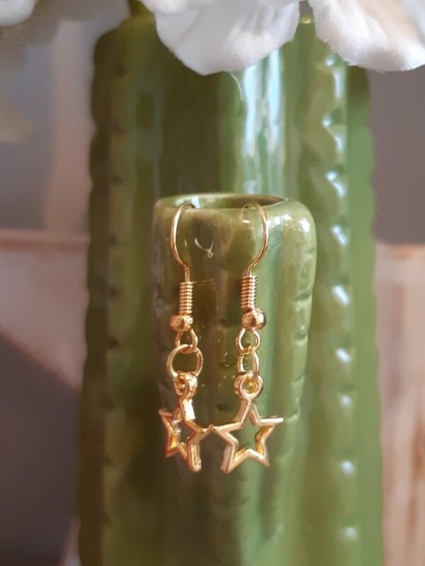 Christmas gold star earrings - main product image