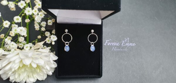 Sterling silver dangle earrings with opal while glass bead - product image 4