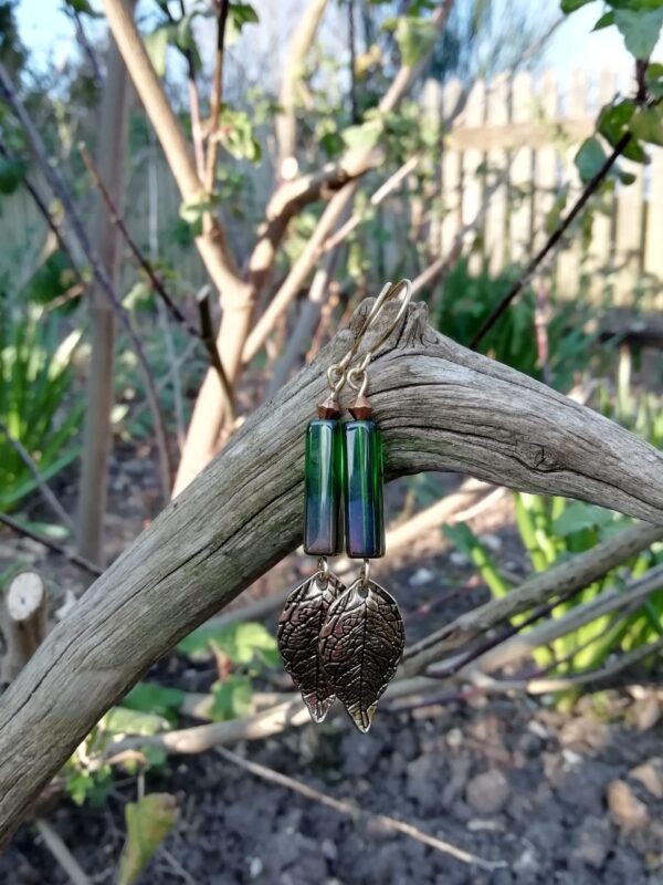 Green and gold brass leaf dangle earrings - main product image