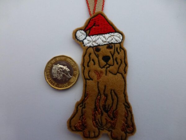 Golden spaniel in santa hat – Christmas tree decoration - main product image