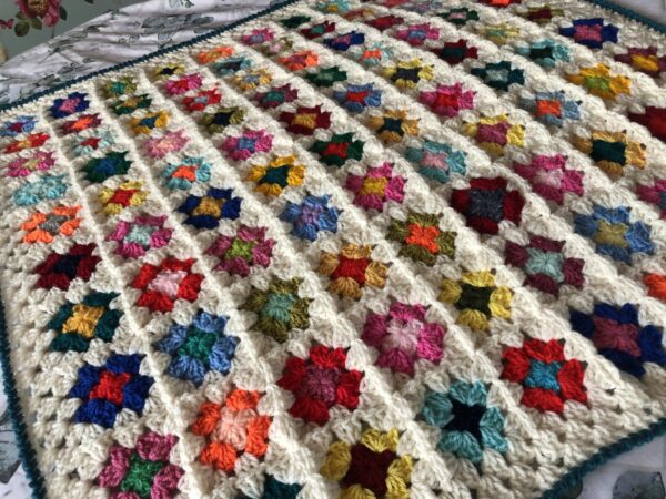 Colourful-Cuddle-up-Crochet Granny Blanket - main product image