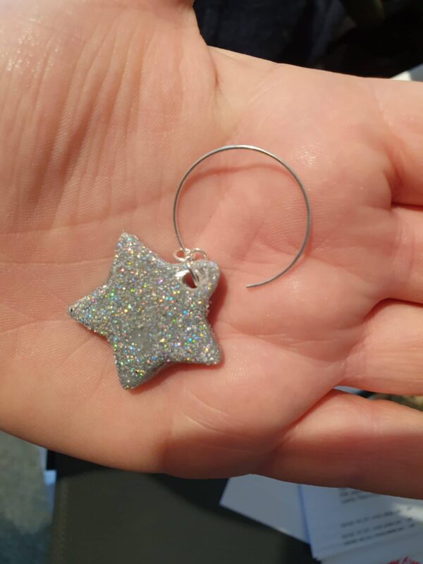 Sparkly glitter star hoop earrings - product image 2