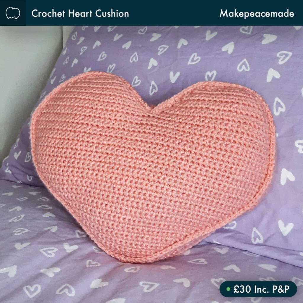 Crochet heart cushion