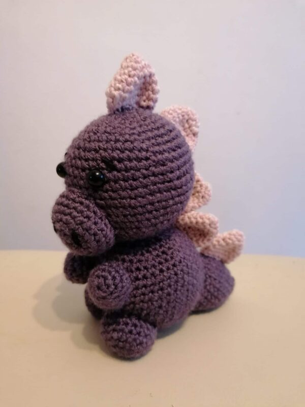 Handmade crochet baby dinosaur toy - main product image