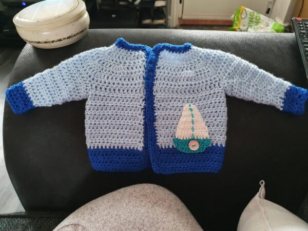 Crocheted baby boy cardigan - main product image