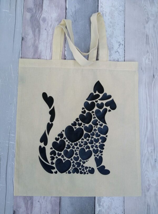 Cat lovers tote bag. Natural cotton shopping bag with a black cat logo. - main product image