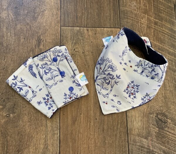 Suck pad set plus matching bib. Suck pads fit all baby carriers - main product image