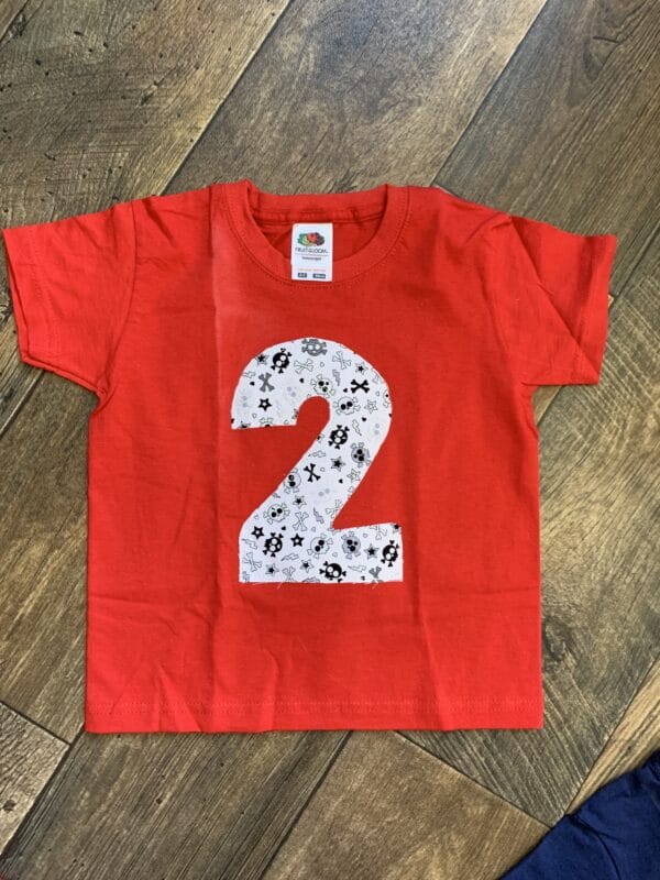 ON SALE Age 2 appliqué birthday t-shirt. Red with Glitter skulls print - main product image