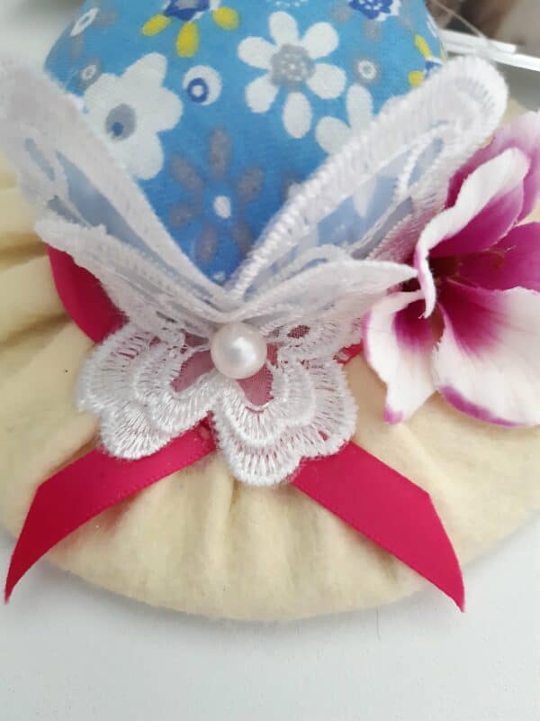 Butterfly flower pincushion hat decoration. - product image 2