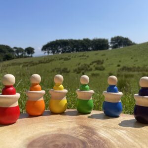 Hand painted wooden peg people with pots