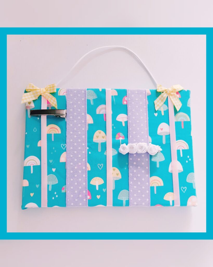 Wall hanging toadstool bow/clip holder.