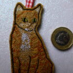Ginger tabby cat hanging decoration