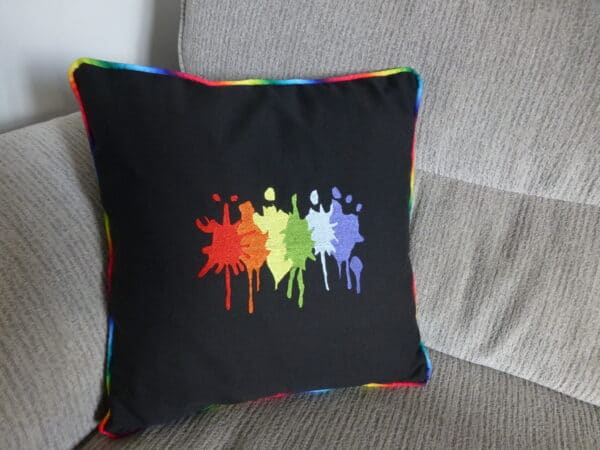 Embroidered cushion cover – paint splash in LGBT colours - main product image