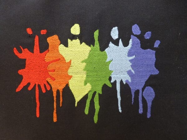 Embroidered cushion cover – paint splash in LGBT colours - product image 2