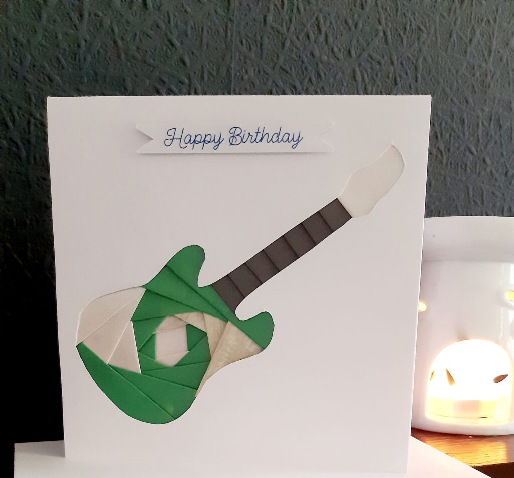 Happy birthday guitar greetings card.