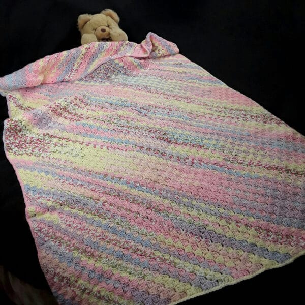 Hand crocheted baby cot bed size pink multicolour c2c blanket - main product image