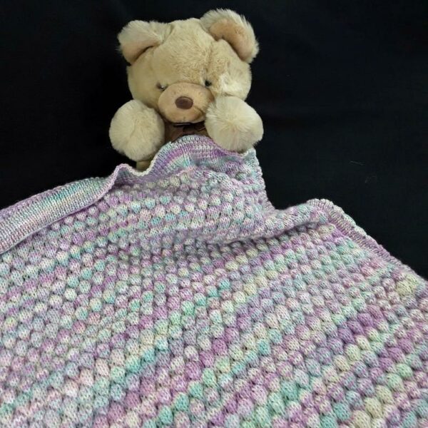 Hand knitted baby multicoloured bobble pram blanket – lilac, pink, green - product image 3