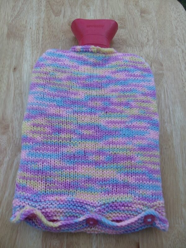 Hot water bottle cover – hand knitted – teddy – pinks - product image 3